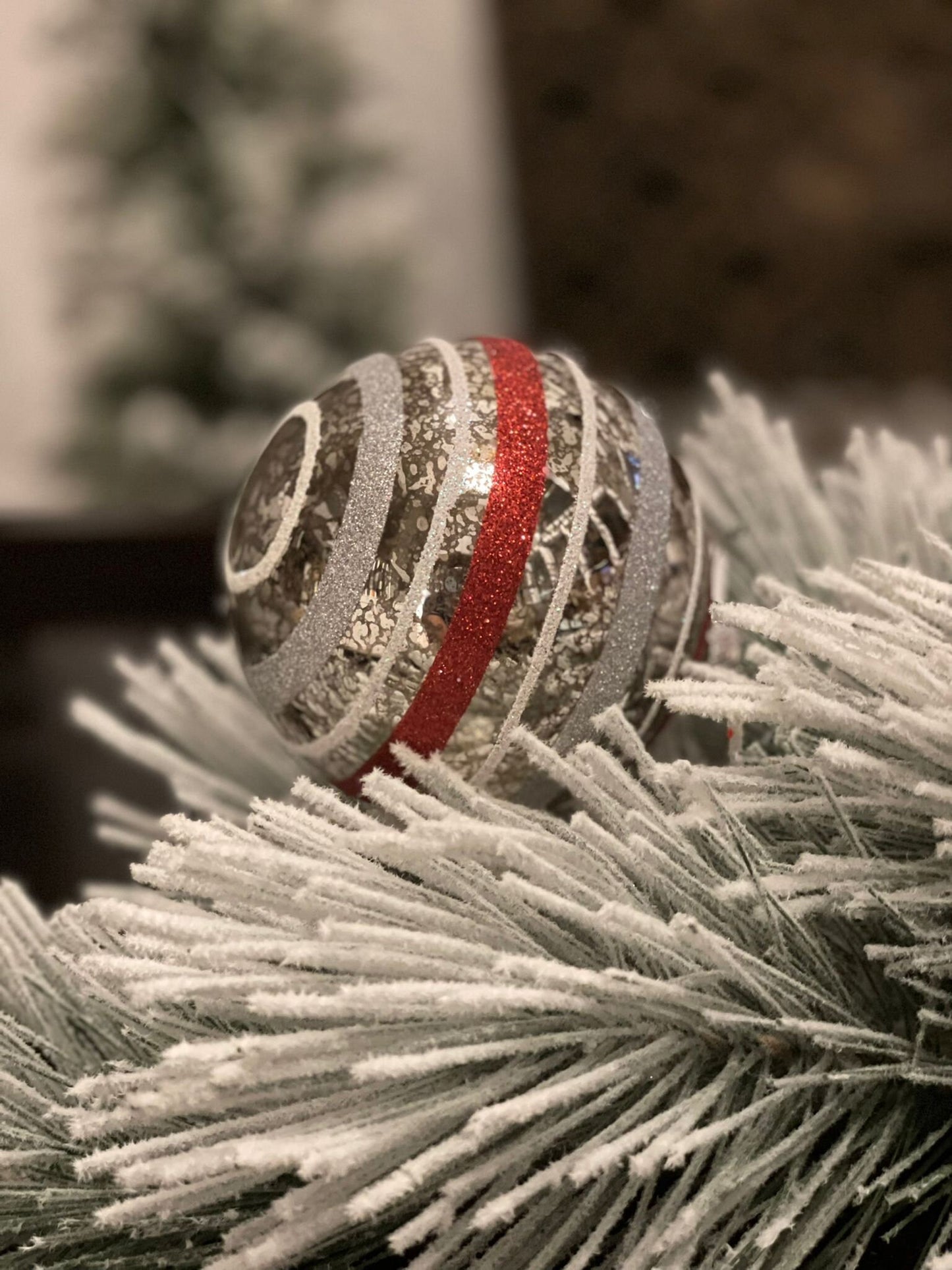 4" Striped glass ornament. Red and silver.