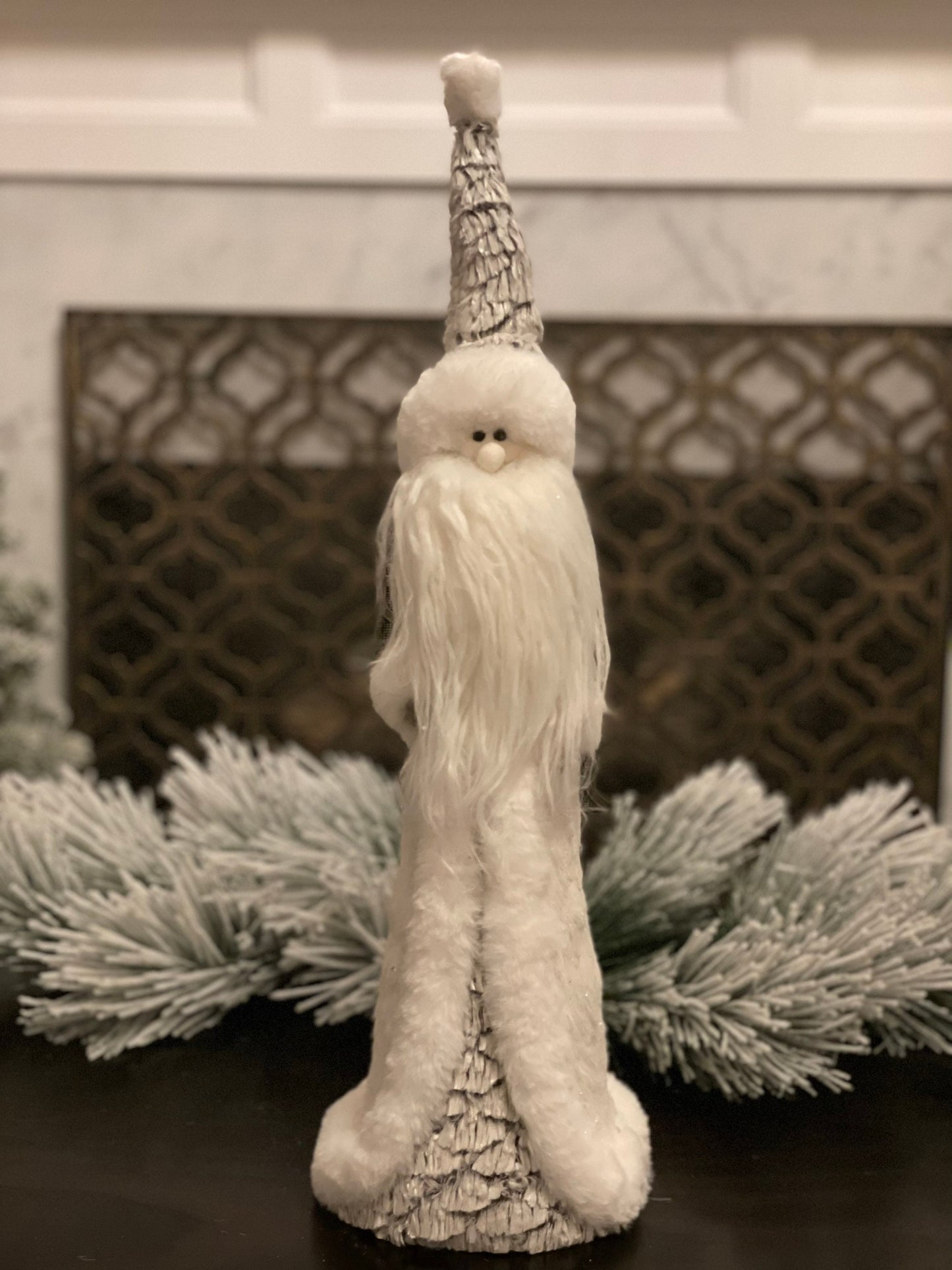 22"x7" frosted artic santa standing.