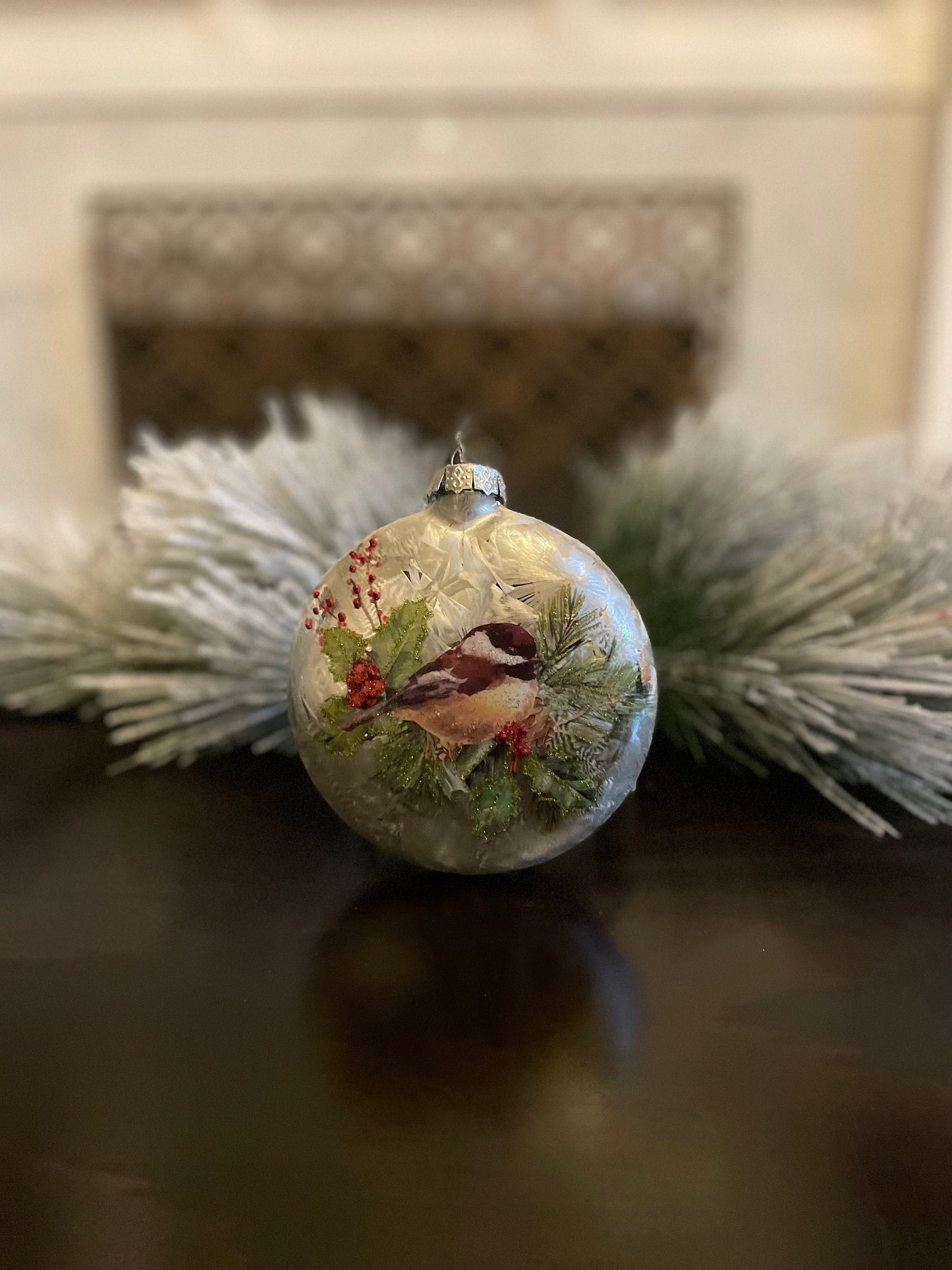 Set of 2. 5.5" Glass chickadee on pine/ berries disc ornament. So beautiful!